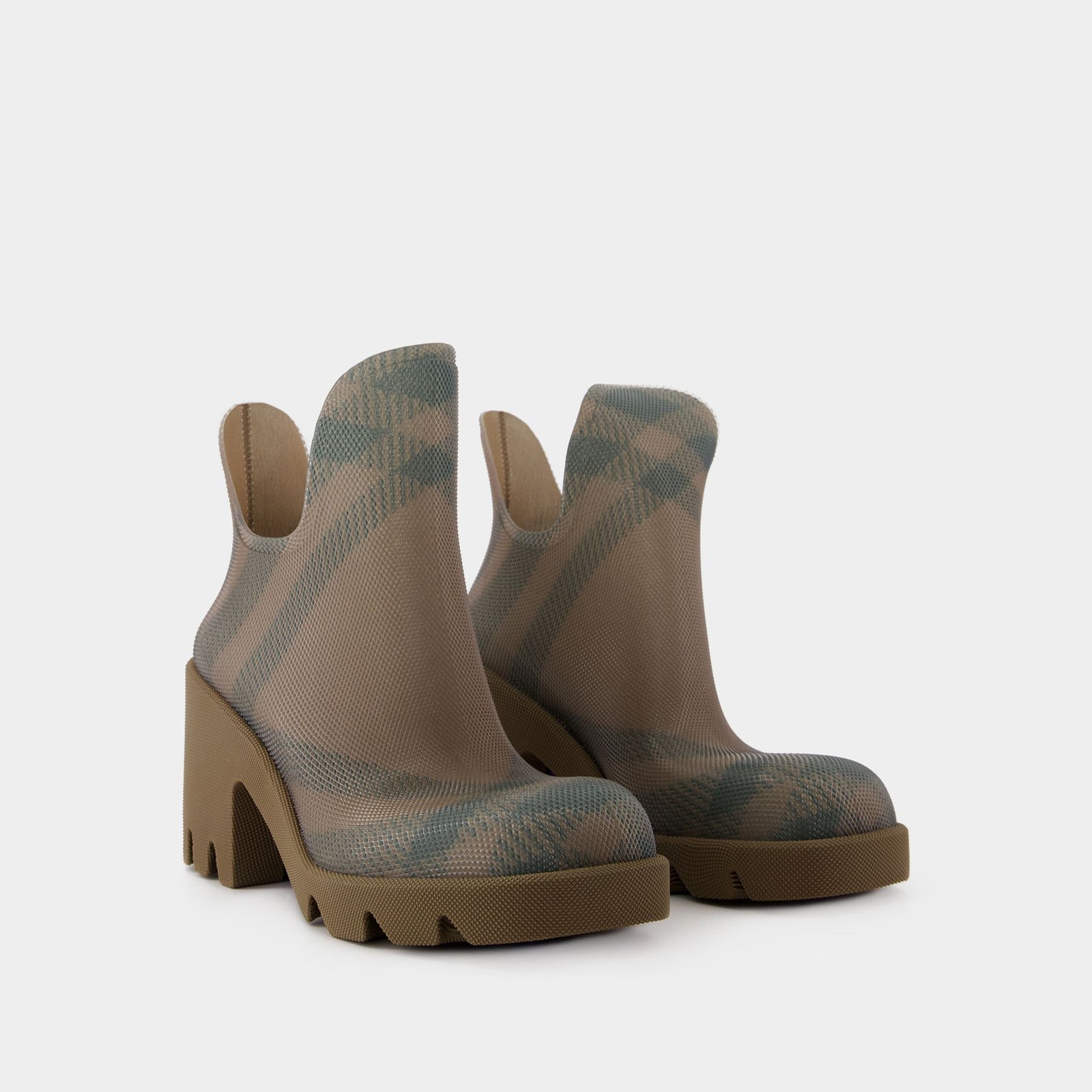 My burberry rain boots turned gray best sale