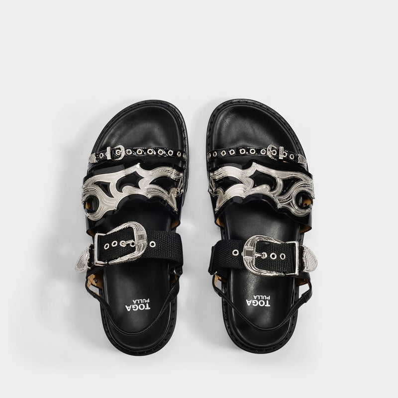 Flat Sandals in Black Leather with Metallic Straps