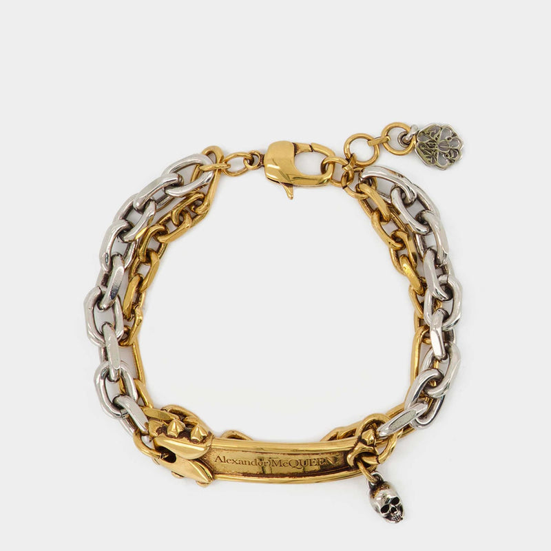 Alexander McQueen - Bracelet with skulls 7284651AAL4 - buy with Luxembourg  delivery at Symbol
