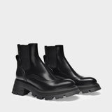 Upper and Ru Ankle Boots in Black Leather