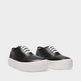 Platform Sneakers in Black Leather